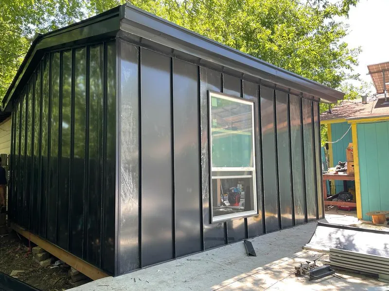 Black standing seam metal wall panels for Metal Roof Installation in Bangor Base